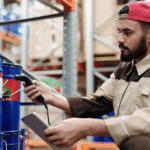 warehouse worker scanning a barrel