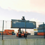 metal container being carried by the forklift