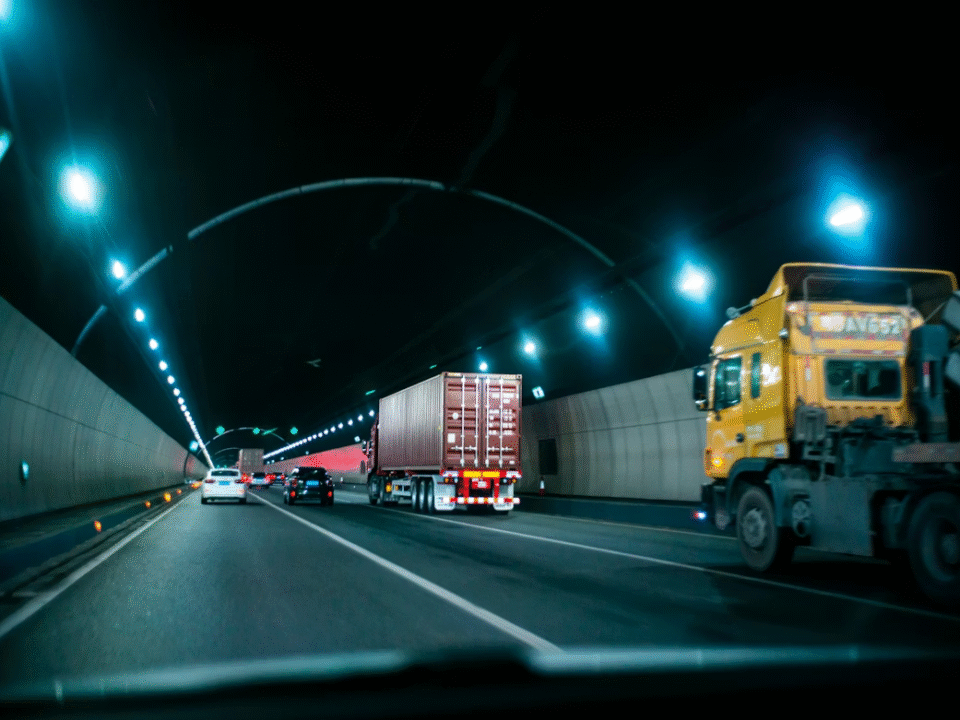 trucks and logistics cars in tunnel