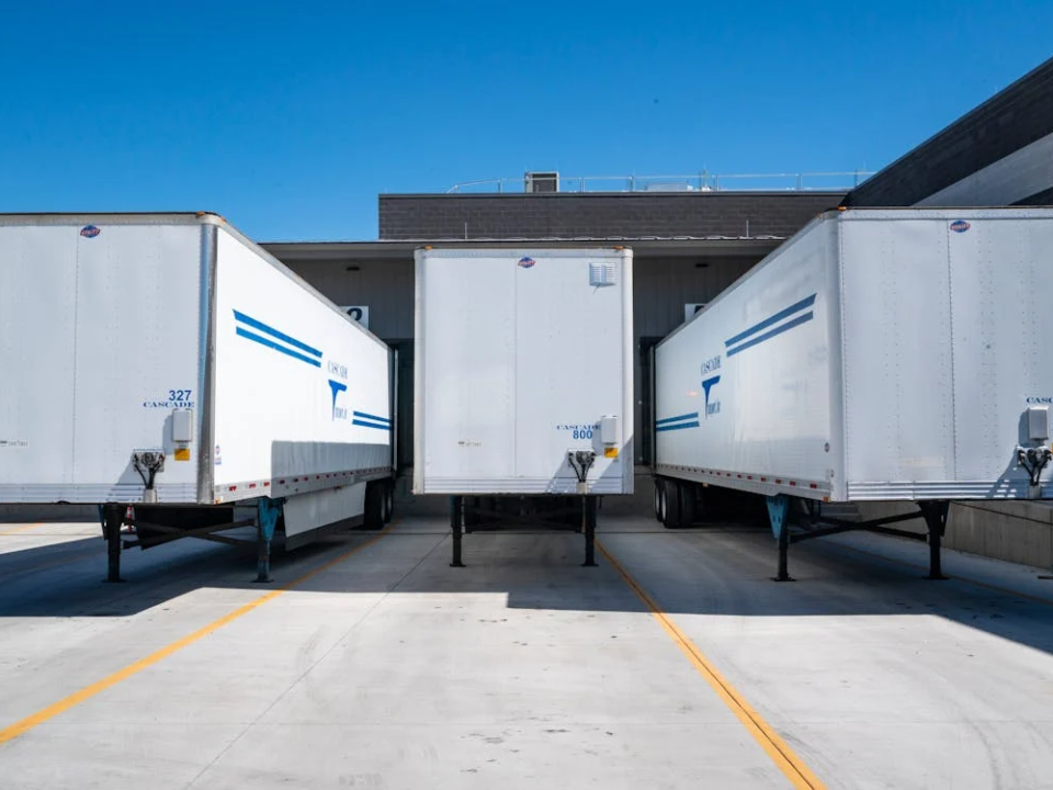 cargo cars waiting outside the warehouse